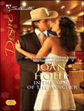 Cover: In the Arms of the Rancher - Silhouette Desire