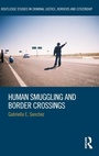 Cover: Human Smuggling and Border Crossings - Routledge