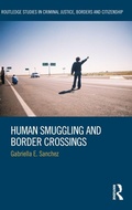 Cover: Human Smuggling and Border Crossings - Routledge
