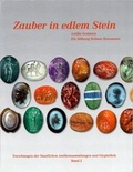 Cover: Zauber in edlem Stein. Antike Gemmen - Die Stiftung Helmut Hansmann - Fink, Josef