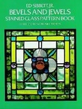 Cover: Bevels and Jewels Stained Glass Pattern Book - Dover Publications Inc.