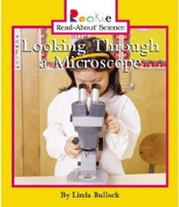 Enlarge image Cover: Looking Through a Microscope - Scholastic US