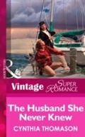 Cover: The Husband She Never Knew - Mills & Boon