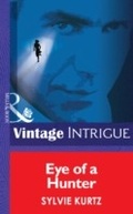 Cover: Eye Of A Hunter - Mills & Boon