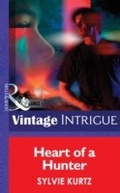 Cover: Heart Of A Hunter - Mills & Boon