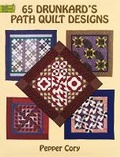 Cover: 65 Drunkard's Path Quilt Designs - Dover Publications Inc.