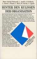 Cover: Hinter den Kulissen der Organisation - Klett-Cotta