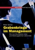 Cover: Grabenkriege im Management - Wirtschaftsverlag Carl Ueberreuter