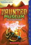 Cover: The Cursed Scarab: Hauntings Novel (Haunted Museum #4) - Scholastic Paperbacks