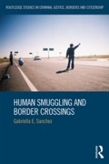 Cover: Human Smuggling and Border Crossings - Routledge