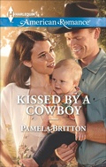 Cover: Kissed by a Cowboy - Harlequin American Romance