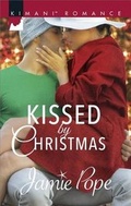 Cover: Kissed by Christmas - Harlequin Kimani Romance