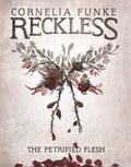 Cover: The Petrified Flesh - Breathing Books