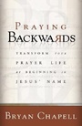 Cover: Praying Backwards - Transform Your Prayer Life by Beginning in Jesus` Name - Baker Books, a division of Baker Publishing Group