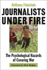 Enlarge image Cover: Journalists under Fire - Johns Hopkins University Press
