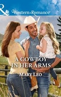 Cover: A Cowboy In Her Arms - Mills & Boon