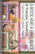 Cover: A Rock And A Hard Place, A Tiger Lily's Cafe Mystery - Tiger Lily's Cafe