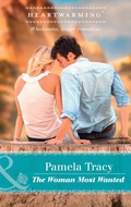 Cover: The Woman Most Wanted - Mills & Boon