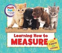 Enlarge image Cover: Learning How to Measure with Puppies and Kittens - Enslow Publishing