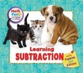 Cover: Learning Subtraction with Puppies and Kittens - Enslow Publishing