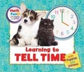 Cover: Learning to Tell Time with Puppies and Kittens - Enslow Publishing