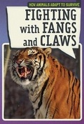Cover: Fighting with Fangs and Claws - PowerKids Press