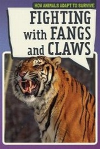 Enlarge image Cover: Fighting with Fangs and Claws - PowerKids Press