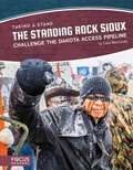 Cover: The Standing Rock Sioux Challenge the Dakota Access Pipeline - Focus Readers