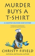 Cover: Murder Buys a T-shirt (A Haunted Souvenir Shop Mystery, #1) - A Haunted Souvenir Shop Mystery