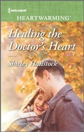 Cover: Healing the Doctor's Heart - Harlequin