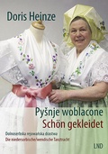 Cover: Sch&ouml;n gekleidet Pysnje woblacone - Domowina-Verlag GmbH