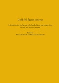 Cover: Gold foil figures in focus - Pfeil, F