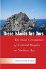 Cover: These Islands Are Ours - Stanford University Press