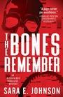 Cover: The Bones Remember - Poisoned Pen Press