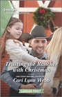 Cover: Trusting the Rancher with Christmas - Harlequin Heartwarming Larger Print