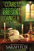 Cover: Claret and Present Danger - Kensington Cozies