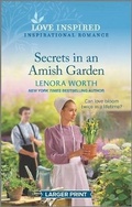 Cover: Secrets in an Amish Garden - Love Inspired Larger Print