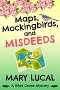 Cover: Maps, Mockingbirds, and Misdeeds (Riley Creek Cozy Mystery Series, #3) - Mary Lucal