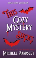 Cover: This Cozy Mystery Sucks (Broken Heart Universe, #1) - Broken Heart Universe