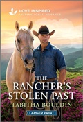Cover: The Rancher's Stolen Past - Love Inspired Larger Print