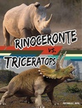 Cover: Rinoceronte vs. Triceratops - Capstone Press