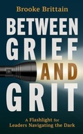 Cover: Between Grief and Grit - STREAMLINE BOOKS